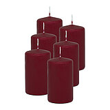 6 Stumpenkerzen von Decolite in der Größe 10x6cm in der Farbe altrot.