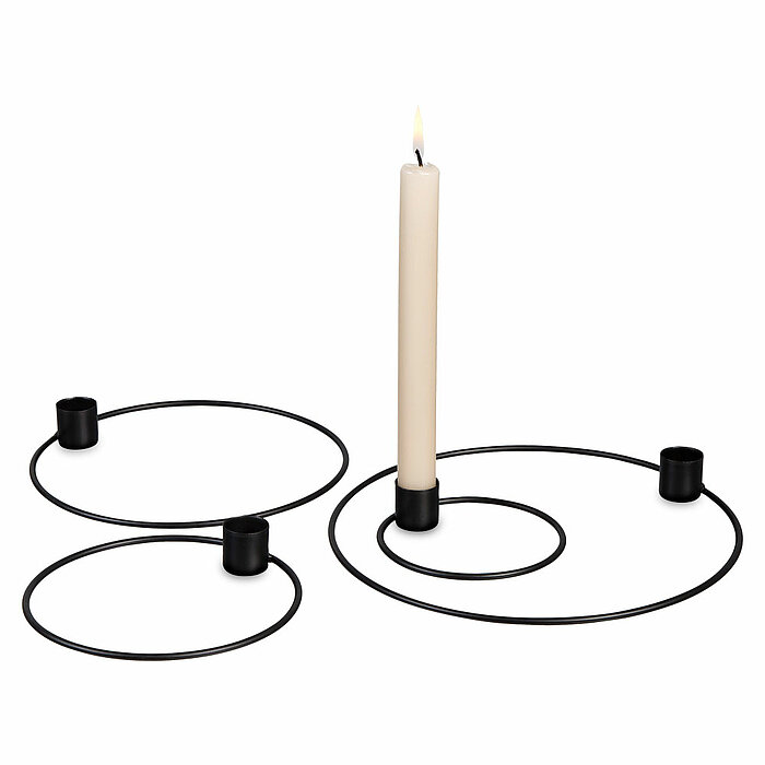 Ein Kerzenhalter-Set "4 Ringe" in der Farbe Schwarz von Halbach.