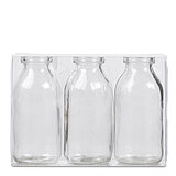 Drei kleine Flaschen Bottle von Sandra Rich in der Größe 10,5x5,0cm in der Farbe klar.