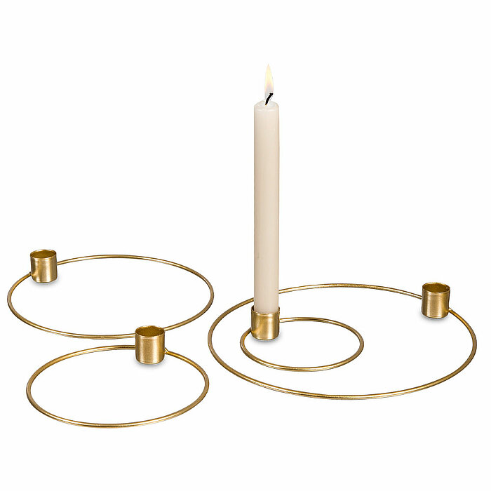 Ein Kerzenhalter-Set "4 Ringe" von Halbach in der Farbe Gold.